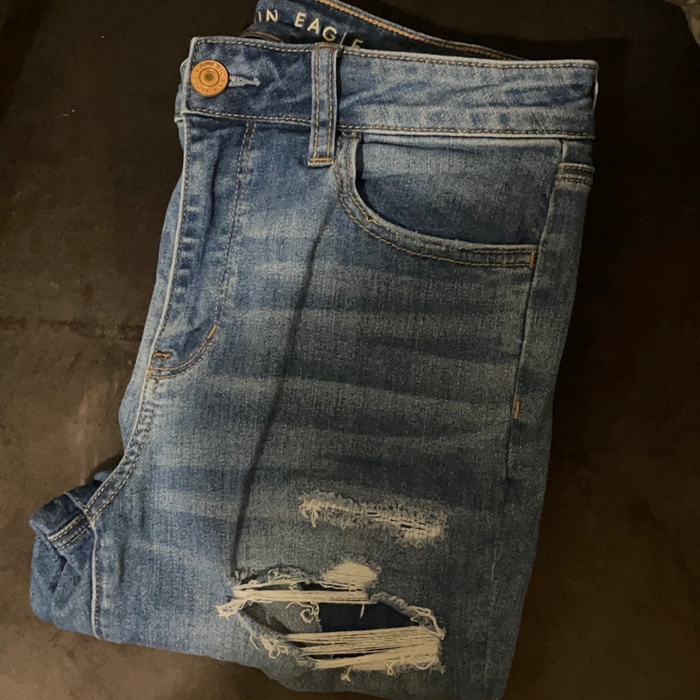 Brand new American Eagle distressed skinny jeans. Size 10.